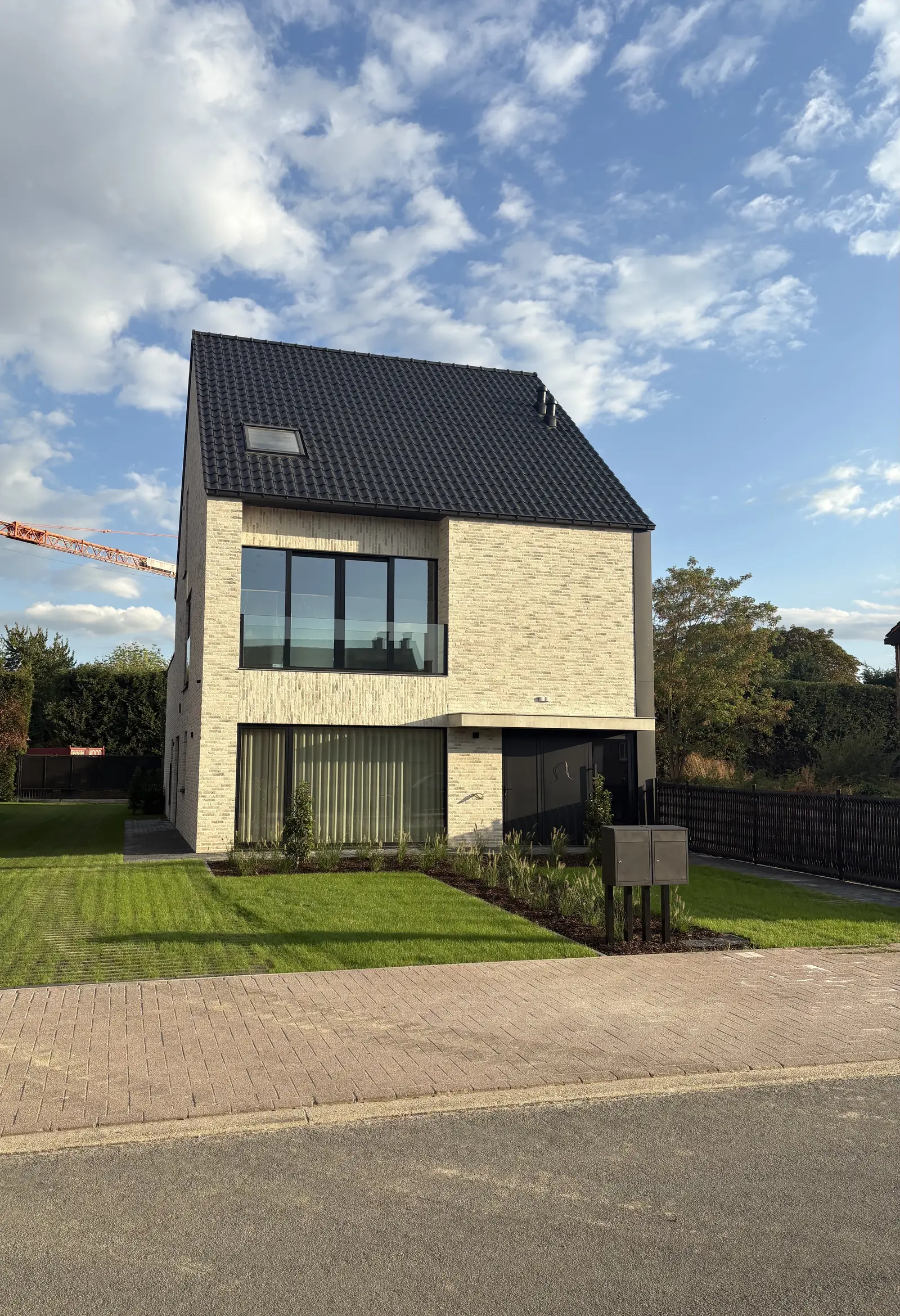 Landelijk-moderne tweewoonst in Maasmechelen, ontwerp Siegert Saeren